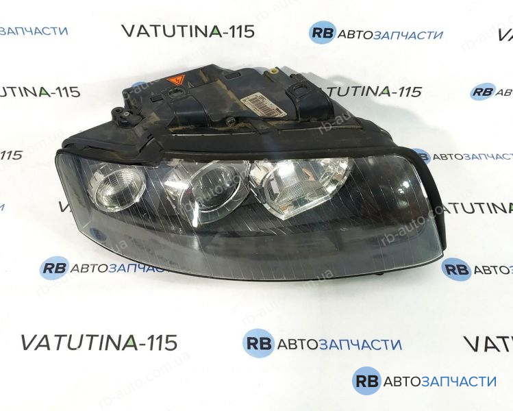 8E0941030T-BU Фара основна R під біксенон