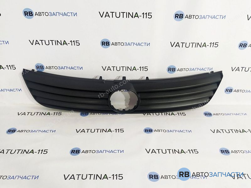KH9539990 Решітка радіатора -ембл.